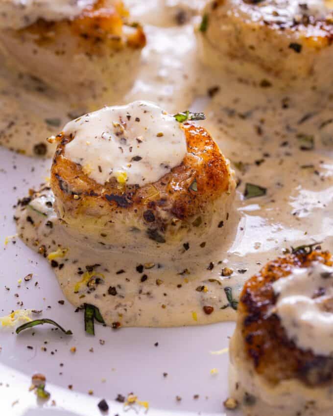 seared scallops in a pesto sauce.
