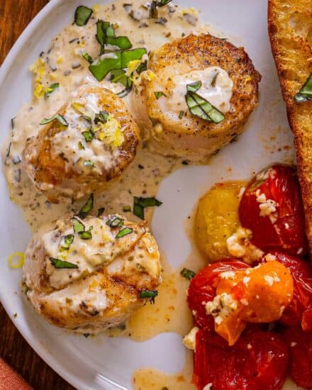 Simple and easy, this creamy pesto scallops recipe is made in one skillet, and ready in about 30-40 minutes! Succulent sea scallops are seared and nestled into a creamy pesto sauce that's packed with bold savory flavors... it's a perfect weeknight dinner idea!