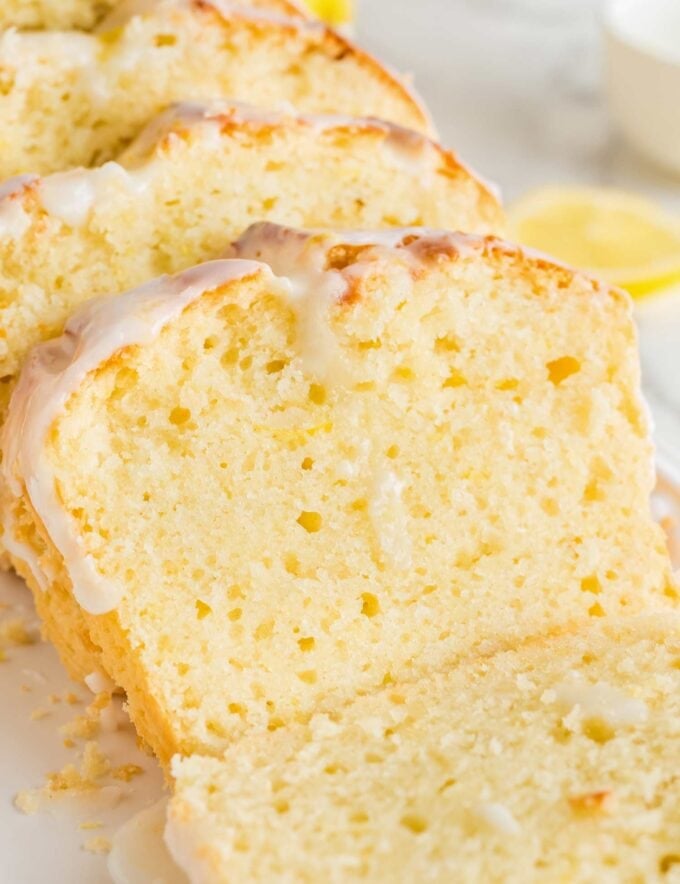 This moist and sweet lemon loaf is so easy to make from scratch, with classic ingredients, and no fancy tools required. It's positively bursting with bright lemon flavors and the sweet/tart lemon glaze really takes this bread over the top!