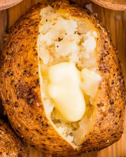 Russet potatoes are rubbed with a garlic salt and pepper blend, then cooked to fluffy perfection in the smoker, infusing the potatoes with a gloriously smoky flavor. They have ultra crispy and flavorful skins and soft and creamy insides, and are ready to be turned into a great side dish, potato bar, or more!
