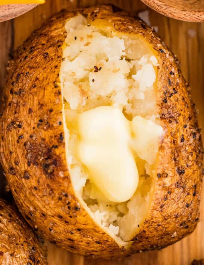 Russet potatoes are rubbed with a garlic salt and pepper blend, then cooked to fluffy perfection in the smoker, infusing the potatoes with a gloriously smoky flavor. They have ultra crispy and flavorful skins and soft and creamy insides, and are ready to be turned into a great side dish, potato bar, or more!