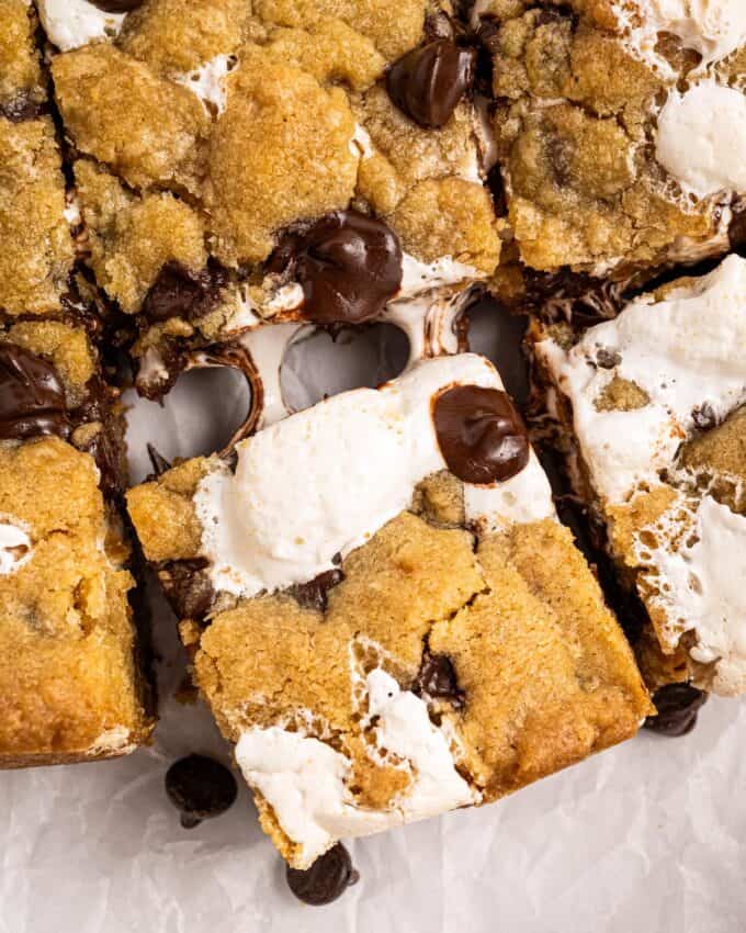 gooey marshmallows in a s'mores cookie bar with melted chocolate.
