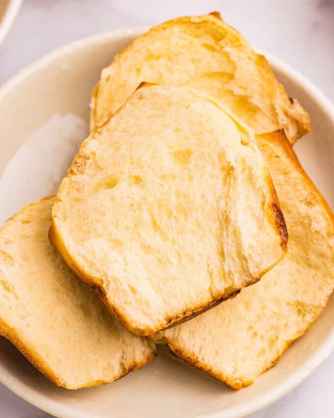 These homemade pull-apart brioche dinner rolls are perfect for your Thanksgiving or holiday dinners! With a make-ahead option, you'll be amazed at how easy it is to make bakery-quality rolls in your own kitchen!