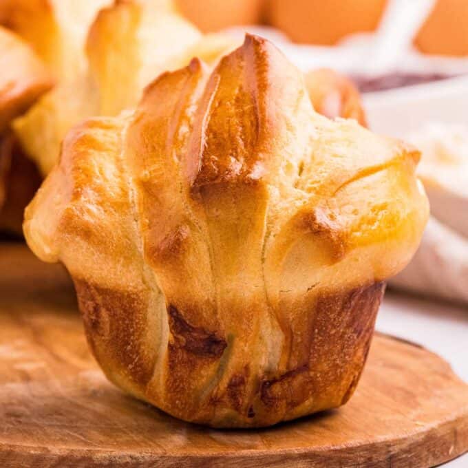 pull apart dinner roll on cutting board