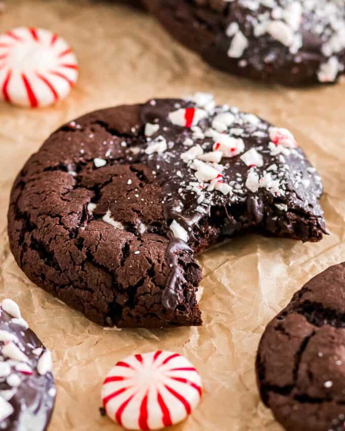 These chocolate peppermint cookies are made with cake mix, studded with crushed peppermint candies, then dipped in melted chocolate and more peppermint. Easy dessert recipes like this are perfect for your holiday gatherings/cookie exchanges, but could use a baking shortcut!