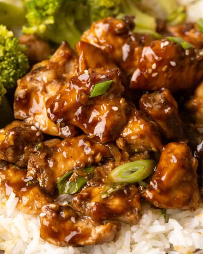 glazed teriyaki chicken bites garnished with green onions
