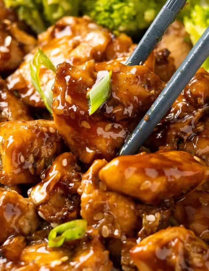 Succulent chicken bites, marinated in a homemade teriyaki sauce, then air fried until juicy and golden brown. Brushed with additional teriyaki sauce, this chicken is fantastic over some rice with broccoli and great for meal prep or an easy dinner idea!