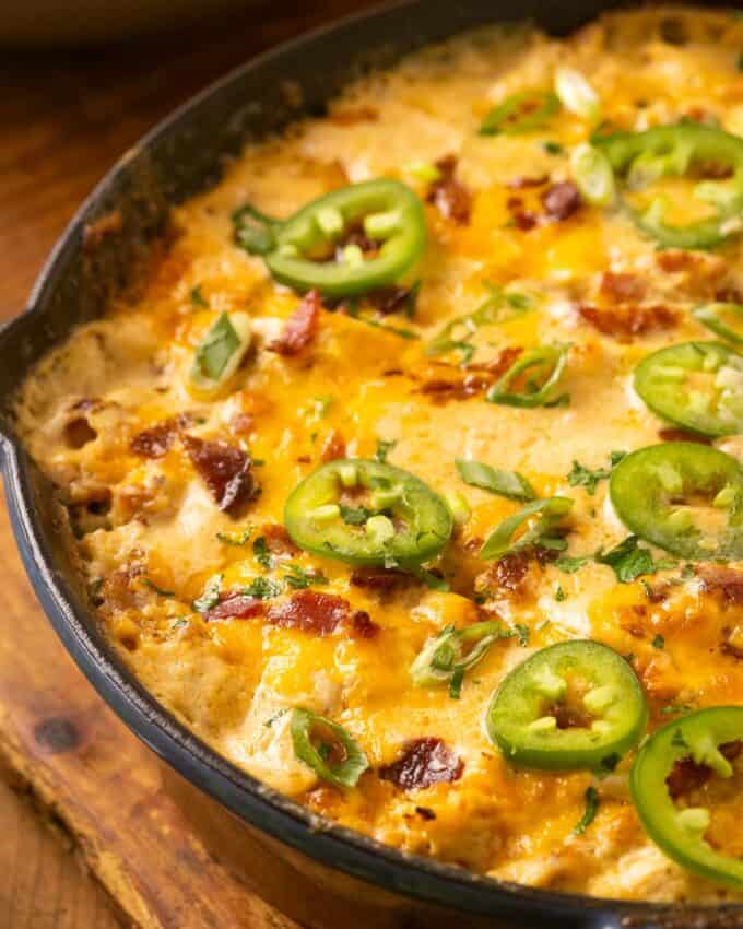 Everything you love about a creamy jalapeño popper dip, combined with cheesy shredded chicken! Great as a dip, served over a baked potato or pasta, or as a fun dinner idea.