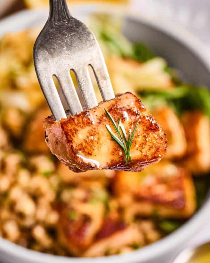 forkful of salmon with maple dijon vinaigrette.