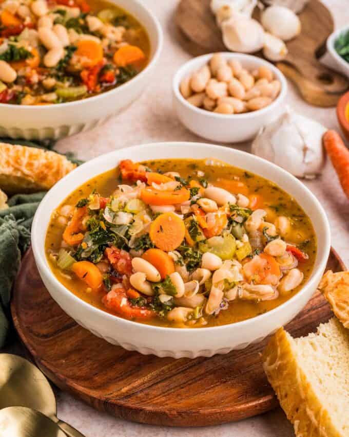 bowls of italian bean soup on a table