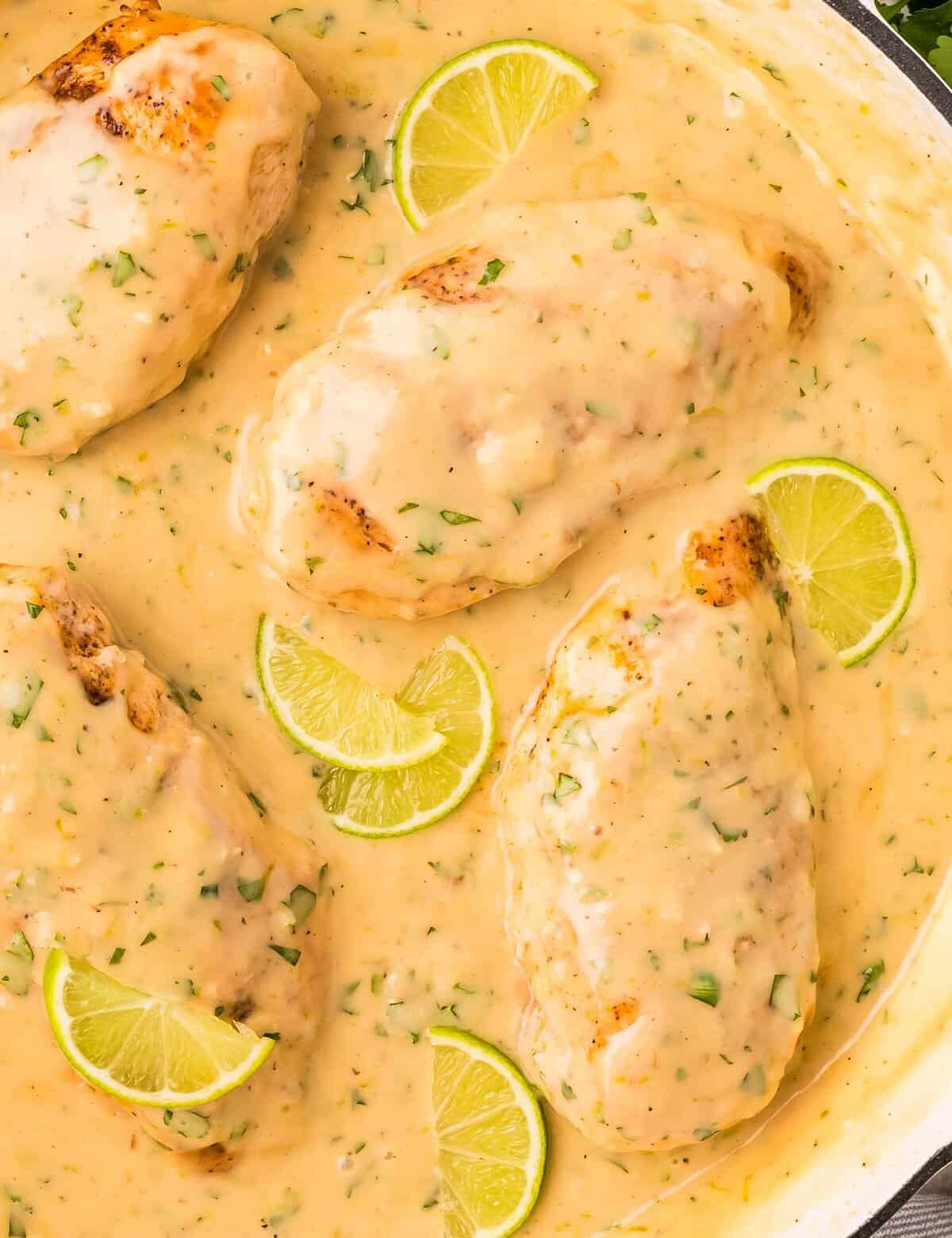 Juicy chicken breasts are smothered in a creamy sauce that's bursting with bright and fresh flavors! The coconut lime sauce is good enough to slurp with a spoon, and the whole recipe is made in one skillet.