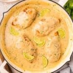chicken breasts in a coconut lime sauce in a skillet
