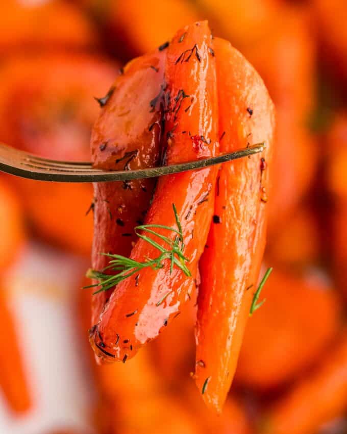 forkful of roasted carrots with honey and dill