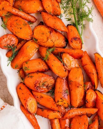 This honey dill roasted carrots recipe calls for minimal, regular ingredients, and uses a straight-forward method for perfectly tender and lightly caramelized carrots. The honey and dill add the perfect blend of sweet and herby goodness!