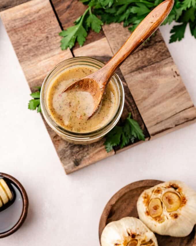 overhead photo of a jar of roasted garlic italian dressing