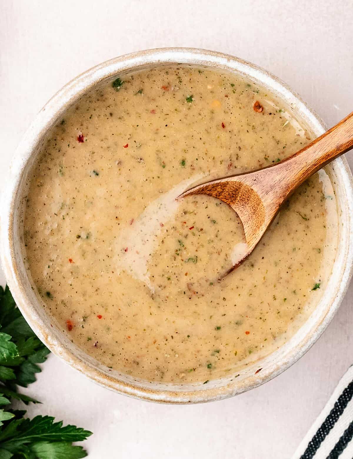 Homemade Italian dressing is fresh, vibrant, zesty, and bursting with herby garlic flavor! So much better than dressing from a bottle, plus it's made with real ingredients (no weird hard to pronounce things), and so easy!