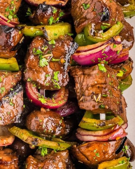 Tender steak bites and fresh mushrooms are marinated in an ultra-flavorful yet easy to make marinade, skewered with onions and peppers, then grilled to juicy steakhouse-style perfection!