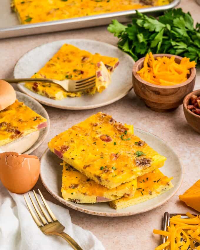 table with egg scramble, plates with slices of eggs