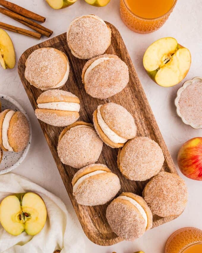 wooden tray filled with apple cider whoopie pies